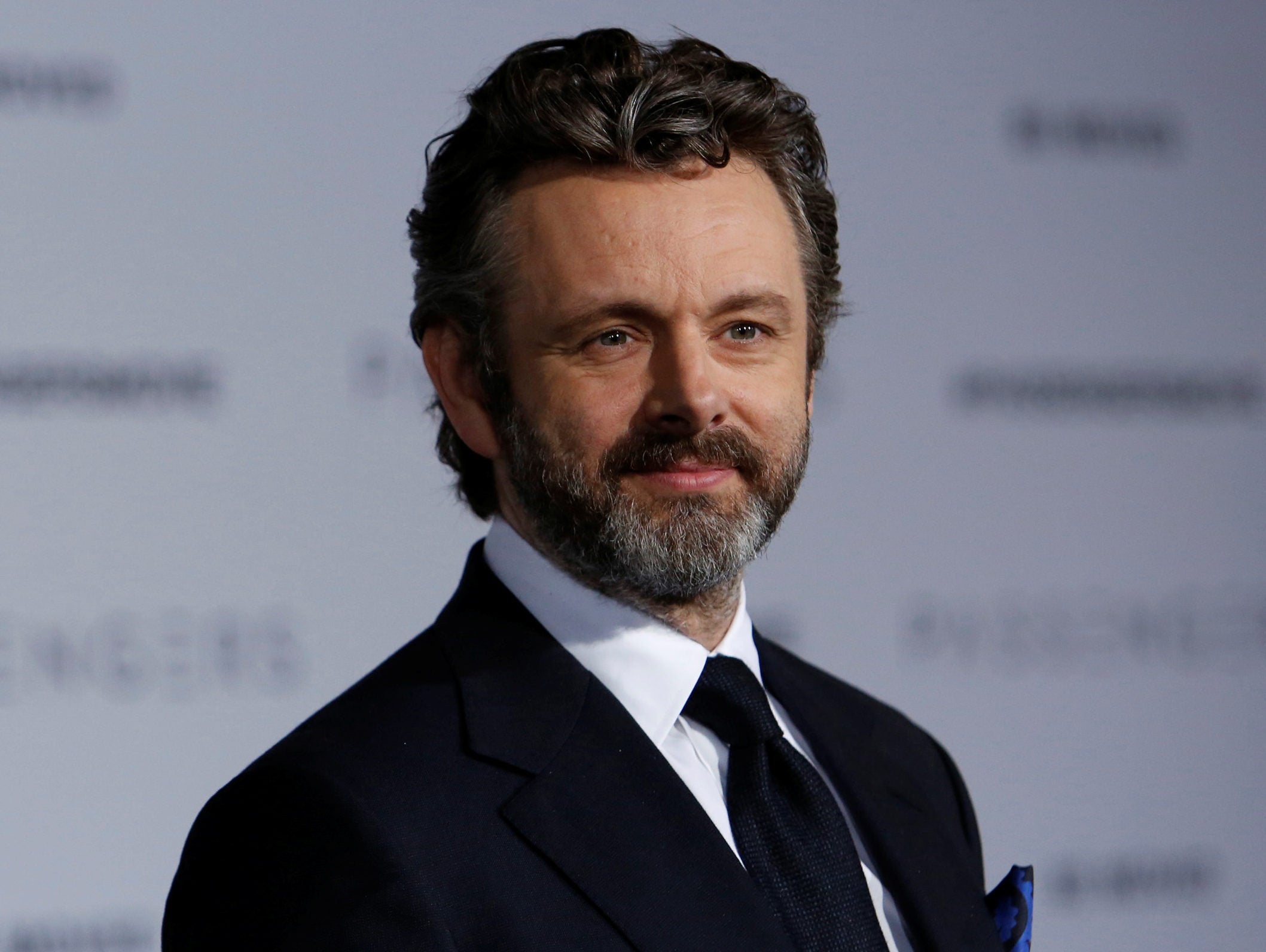 Michael Sheen says press reports he has swapped acting for activism are wrong