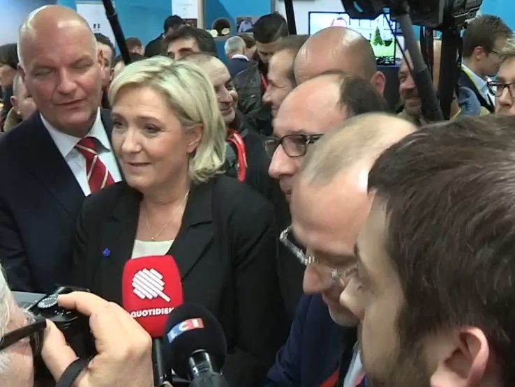 French journalist violently ejected by security guards after attempting to ask probing question of Marine Le Pen