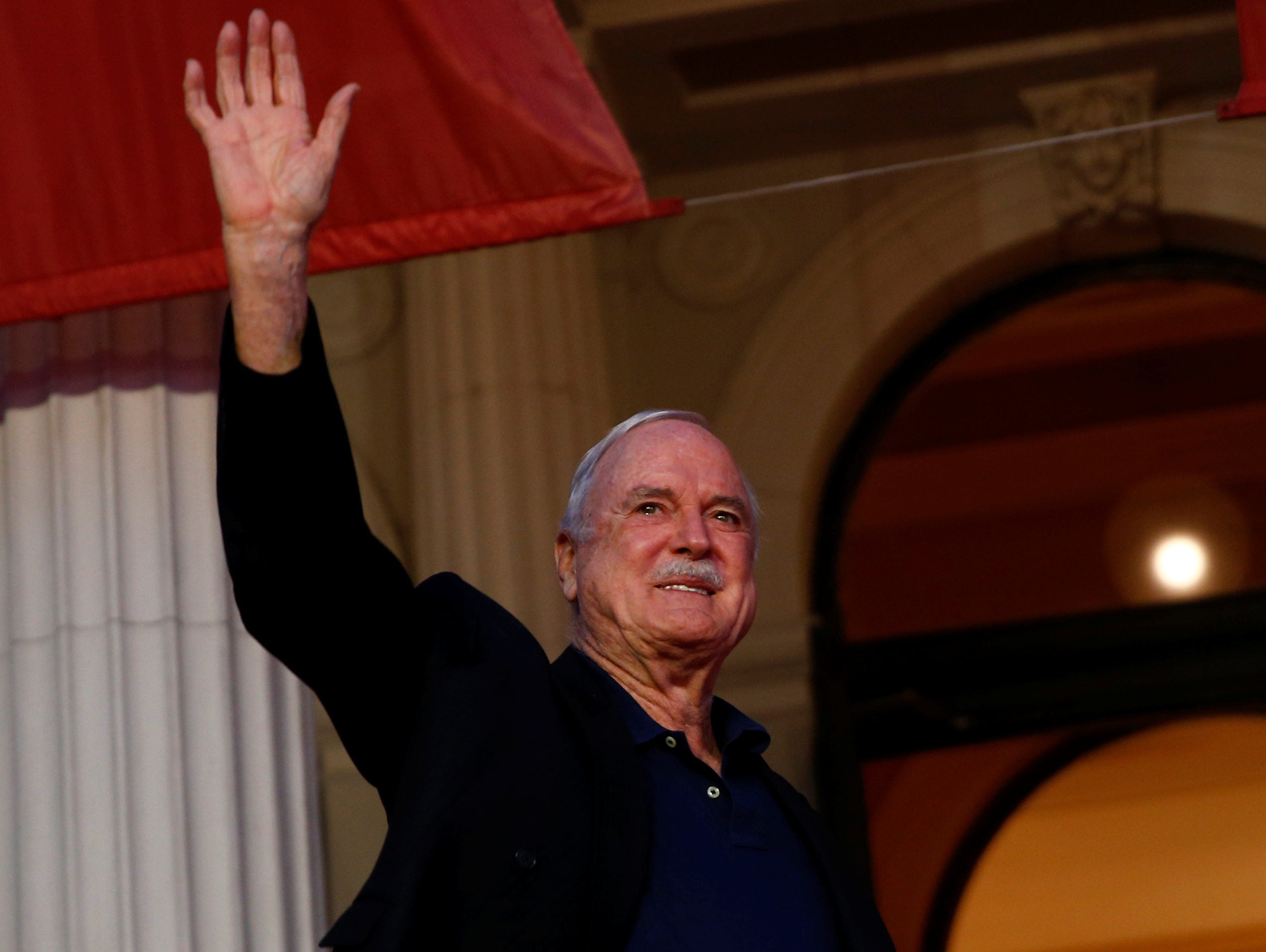 Hacked Off supporter John Cleese points finger at 'lying' and 'right-wing' UK press in decision to leave Britain for the Caribbean