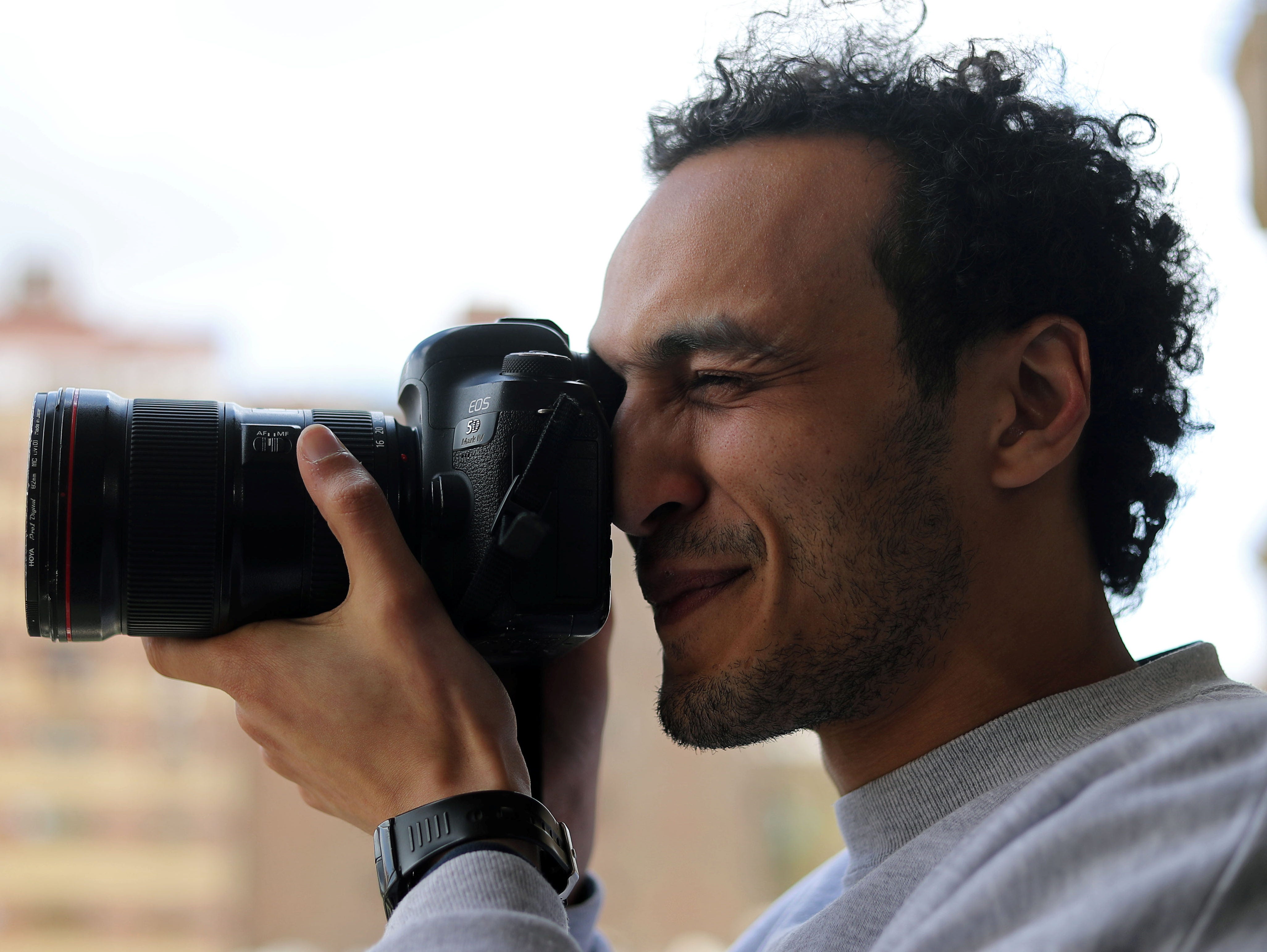 Egyptian photojournalist released from prison after five years but must spend nights at police station