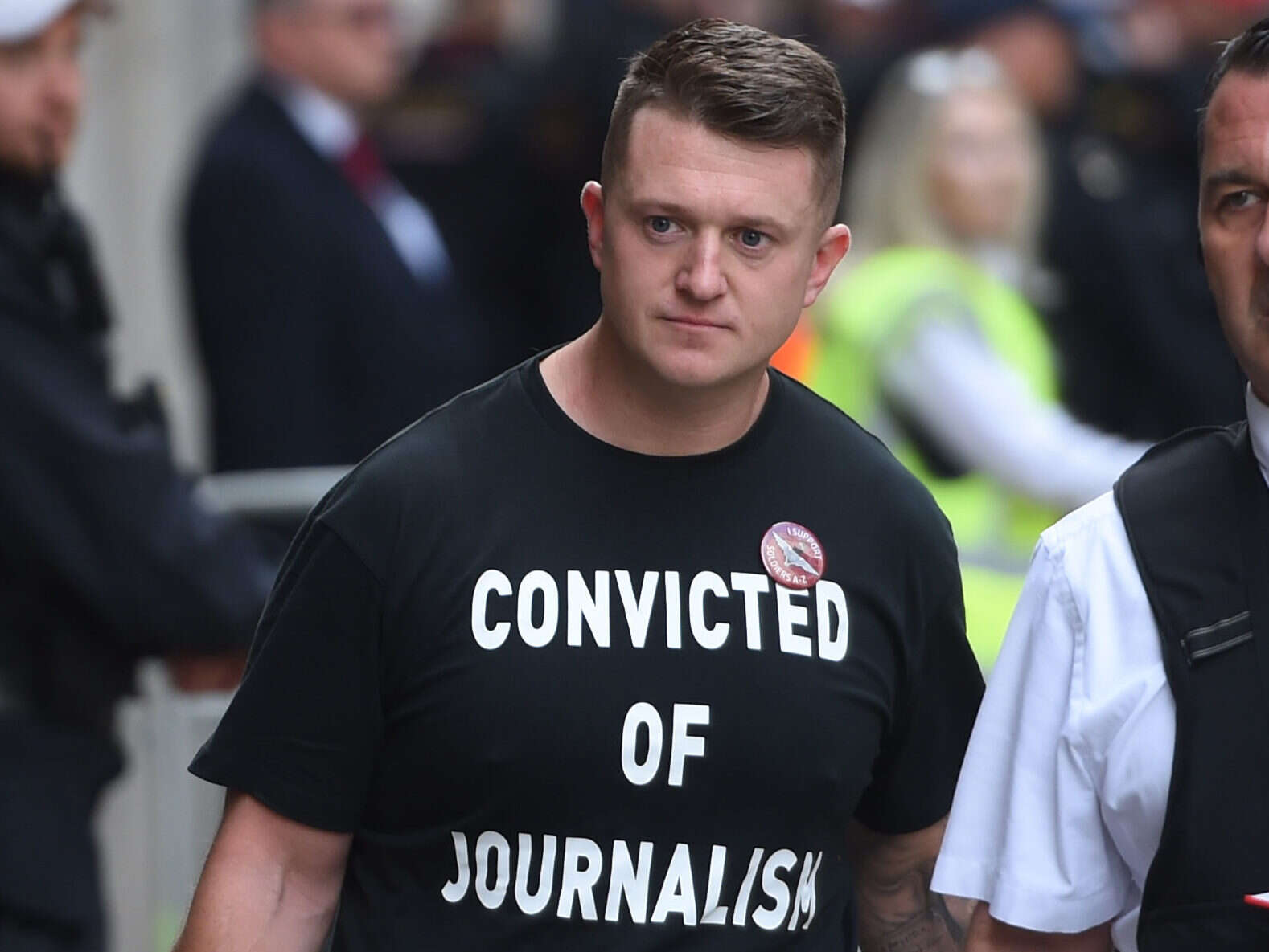 Tommy Robinson sentenced to nine months behind bars for contempt of court