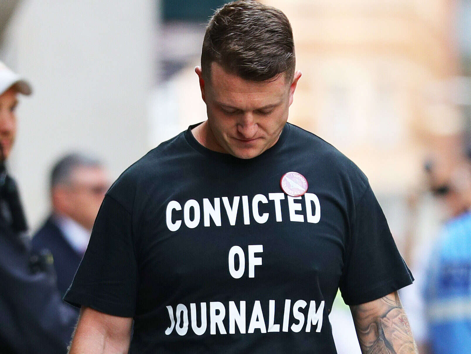 Tommy Robinson's 'convicted of journalism' t-shirt slogan claim a 'farce', say editors