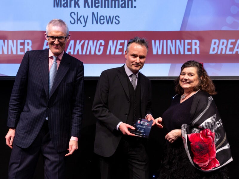 Colleague picking up British Journalism Award on behalf of Mark Kleinman of Sky News pictured with Anne Boden, CEO of Starling Bank