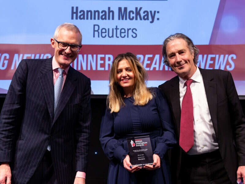British Journalism Awards winner Hannah McKay of Reuters pictured with Jeremy Vine and Robin Morgan of sponsor Iconic Images