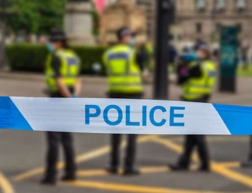 A picture of police behind a cordon, illustrating a story about a new report from the Crime Reporters Association, Society of Editors and the Media Lawyers' Association, that has been submitted to the National Police Chiefs Council and the College of Policing. The report makes 26 recommendations as to how the "broken" relationship between the police and the media can be fixed.