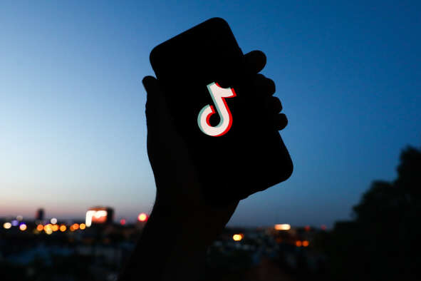 Tiktok logo on a phone