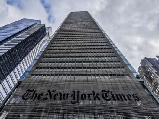 The New York Times building, illustrating a story about the newspaper disbanding its sports desk and handing sports coverage over to The Athletic