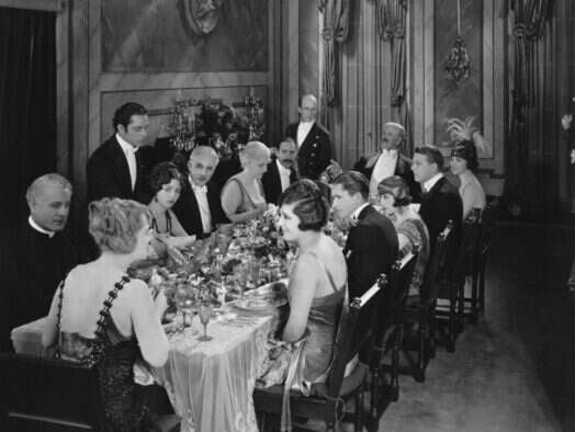 Posh dinner party to illustrate upper class journalists story