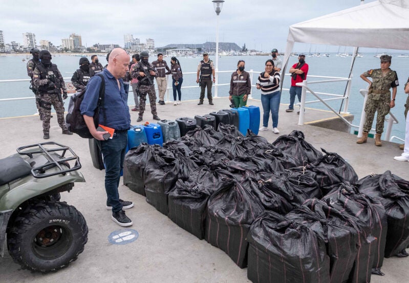 Stephen Wright examining US$20 million cocaine seizure in Ecuador.