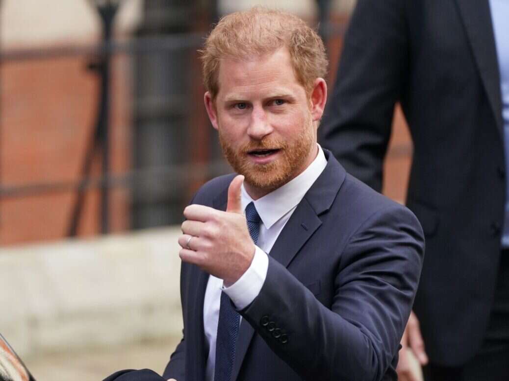 Prince Harry outside High Court, where he will return to give hacking evidence