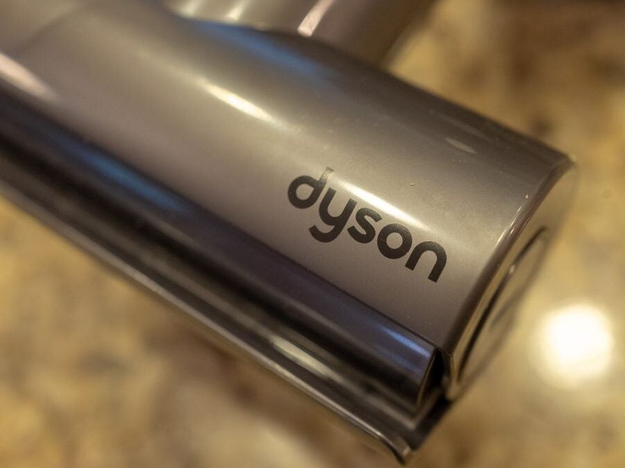 Dyson logo on a vacuum cleaner