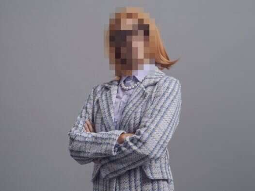 Woman with identity blurred out