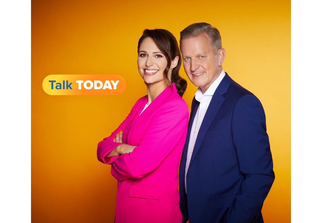 Nicola Thorp and Jeremy Kyle, the hosts of TalkTV's new breakfast programme Talk Today, stand together looking side-on at the camera against an orange background. Kyle has told Press Gazette that "the world has moved on" from his daytime television programme, The Jeremy Kyle Show, which was cancelled in May 2019 following the death of a guest.