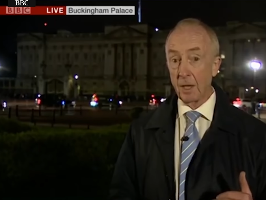 Nicholas Witchell depicted during a live BBC broadcast from outside Buckingham Palace. Witchell's announcement from the BBC has been announced for early 2024.