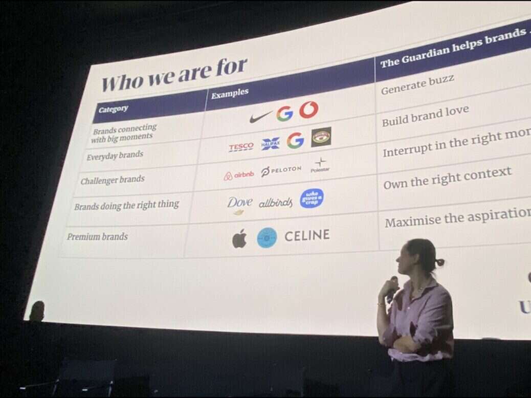 Guardian chief advertising officer Imogen Fox stands in front of a screen at the publisher's advertiser upfront at the Curzon Bloomsbury, London, in November 2023. Picture: Press Gazette