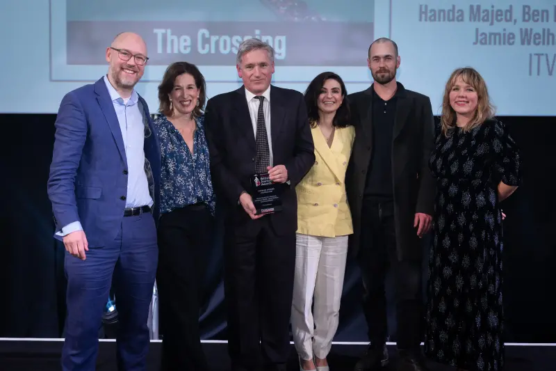 The ITV Exposure team that made The Crossing pick up the Foreign Journalism award at the British Journalism Awards 2023. Picture: ASV Photography for Press Gazette