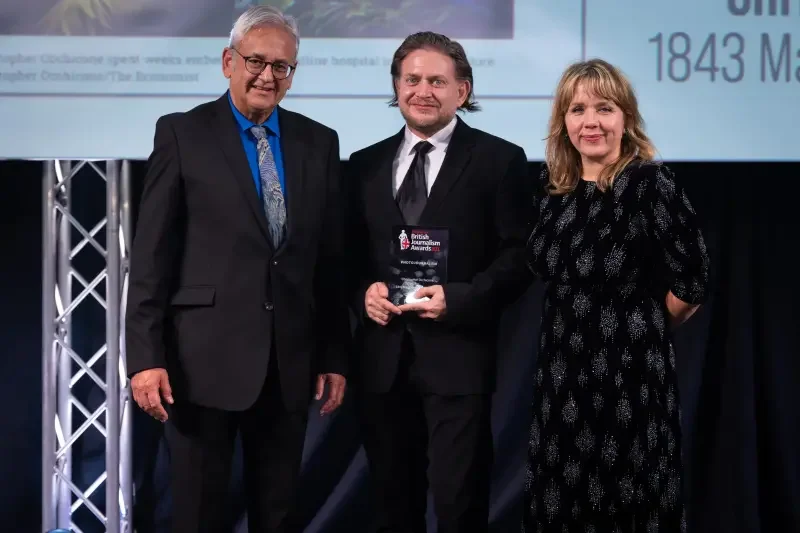 Christopher Occhicone  of The Economist’s 1843 Magazine picks up the Photojournalism prize at the British Journalism Awards 2023. Picture: ASV Photography for Press Gazette
