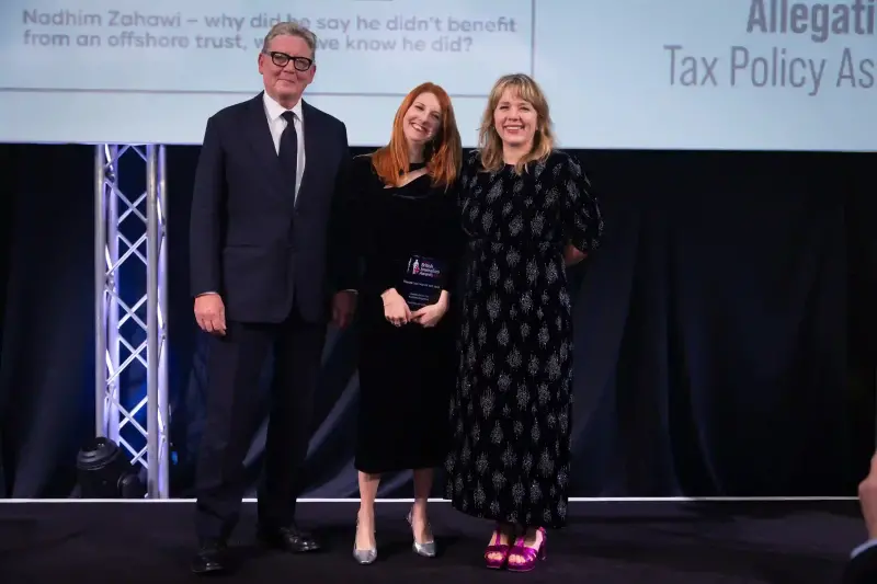 Ashley Armstrong pictured picked up investigation of the year at the British Journalism Awards along with Richard Caseby from the judging panel and host Kerry Godliman.