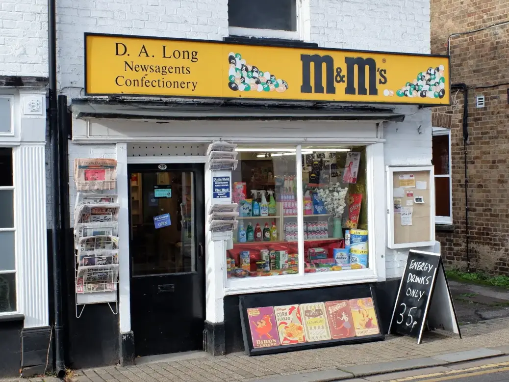 Newsagent in Watford selling local newspapers outside. Picture: Shutterstock
