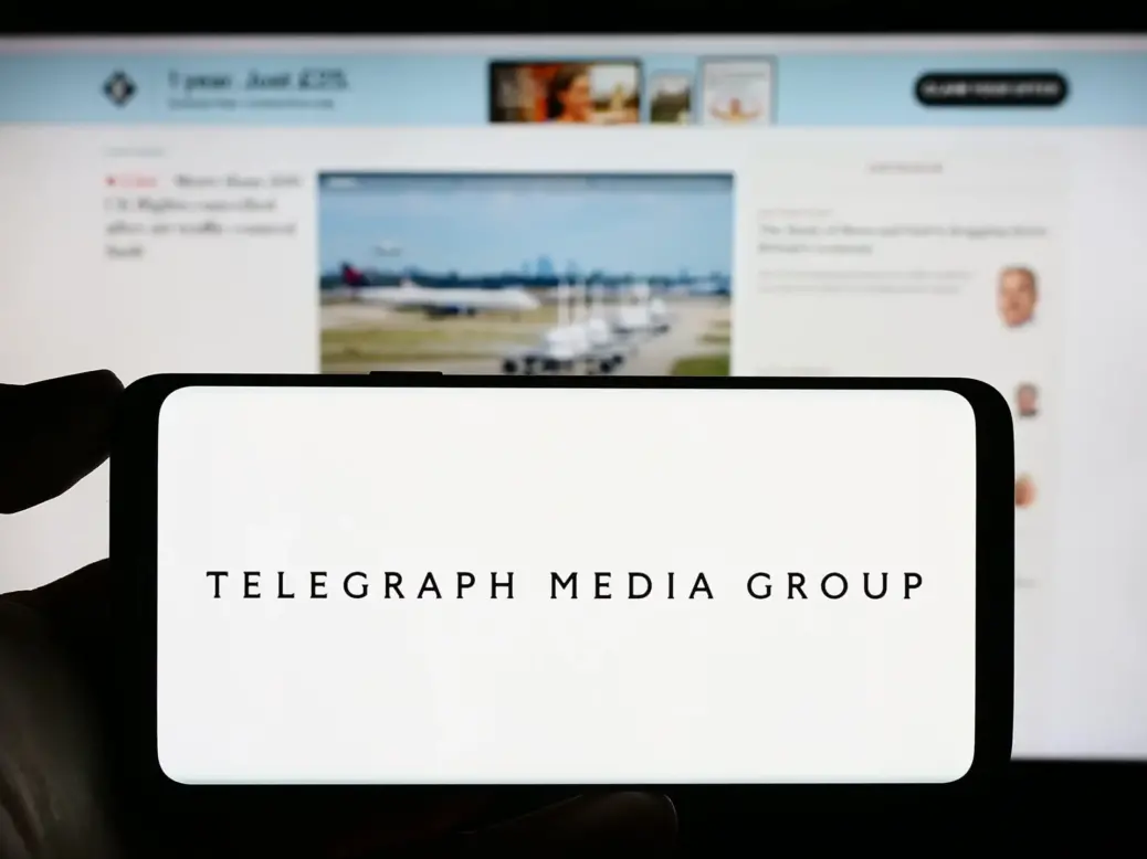 Telegraph Media Group corporate logo and Telegraph website. Picture: Shutterstock/T. Schneider