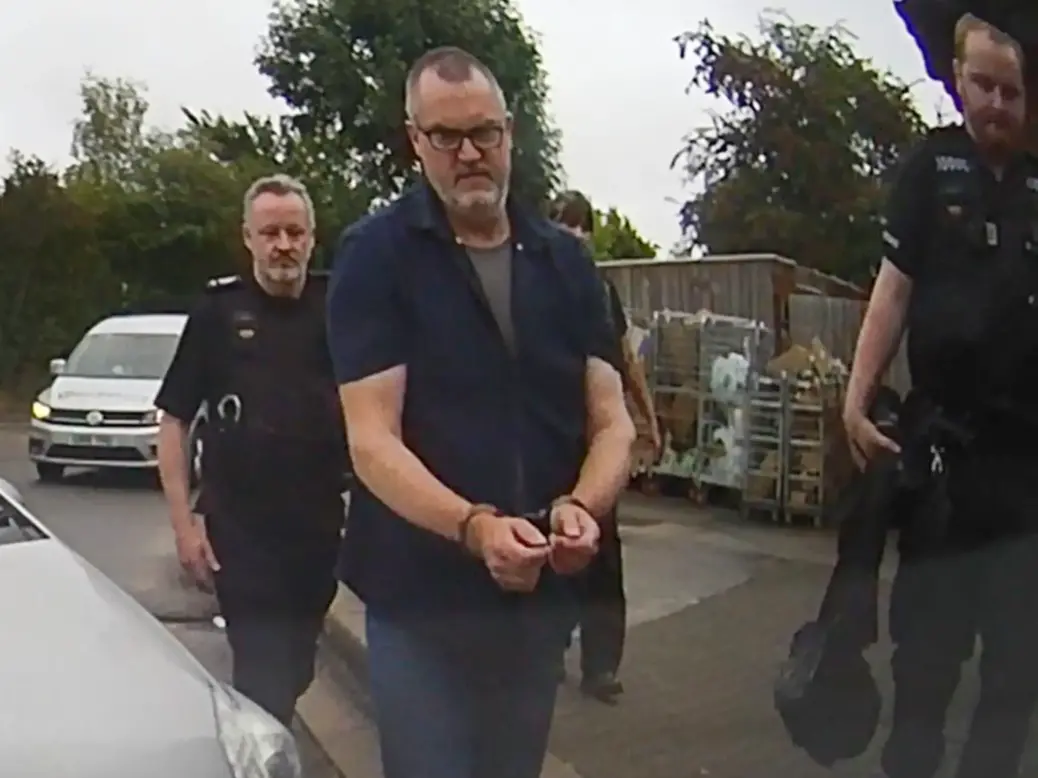 Handout still from dashcam footage dated 24/08/22 of photographer Peter Macdiarmid, 59, who has received a payout from Surrey Police after he was arrested by police during a Just Stop Oil petrol station protest on the M25. Picture: Peter Macdiarmid/PA Wire