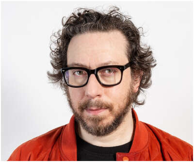 A headshot of Joshua Topolsky, the editor-in-chief and president of Sherwood News, a new news outlet launched by retail trading platform Robinhood.