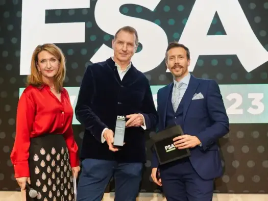 Times chief football writer Henry Winter collecting his Writer of the Year prize at the Football Supporters' Association Awards in December 2023 from the BBC's Victoria Derbyshire. Picture: FSA/Matt Walder