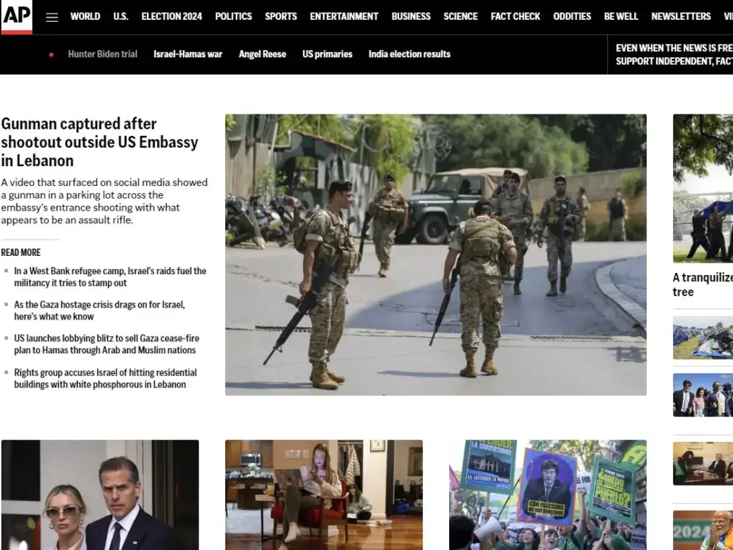 Associated Press homepage with main headline: Gunman captured after shootout outside US Embassy in Lebanon accompanied by a picture of soldiers with guns on a road. Headings at top include: world, US, election 2024, politics, sports, entertainment and business