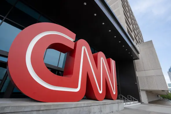 A giant CNN sign is seen at the entrance to the CNN Center in Atlanta, Georgia, the international headquarters of the Cable News Network. Picture: Shutterstock/Tada Images