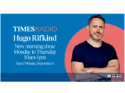 A blue graphic from Times Radio announcing Times columnist Hugo Rifkind as the station's new weekday breakfast presenter. Rifkind stands in front of a large pastel red circle. The text reads: Times Radio / Hugo Ridking / New morning show Monday to Thursday 10am to 1pm, Starts Monday September 9