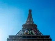 Olympic rings are seen on the Eiffel Tower in Paris, the host of the 2024 Summer Olympic Games.