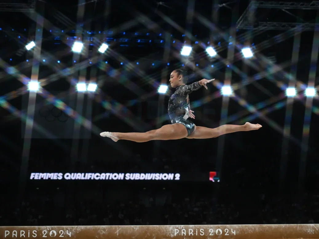 US Olympic gymnast Simone Biles performs with the US gymnastics team at the Olympic Games in Paris. Image: Shutterstock