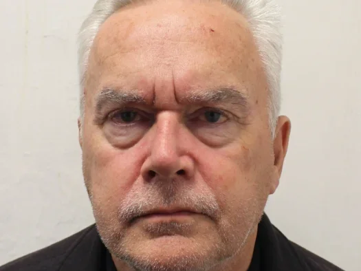 Huw Edwards photo to mark sentencing: unshaven, looking straight into camera unsmiling