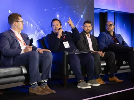 A panel of speakers at Press Gazette's Future of Media Technology Conference in September 2024. Left to right: Forbes SVP of global sales Kyle Vinansky, Insurads CMO Nuno Brilha, Telegraph senior director of digital solutions Gareth Cross and Newsquest digital transformation director Morgan Stevenson. The group are seen discussing advertising on the open web and the effect of Google's cancelled deprecation of third-party cookies on their first-party data strategies.