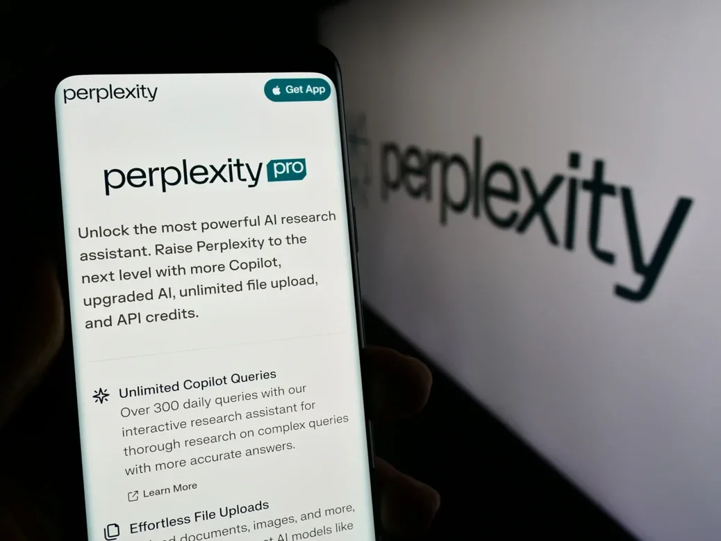 Perplexity connected a phone, illustrating news that News Corp has lodged a suit against nan AI hunt engine