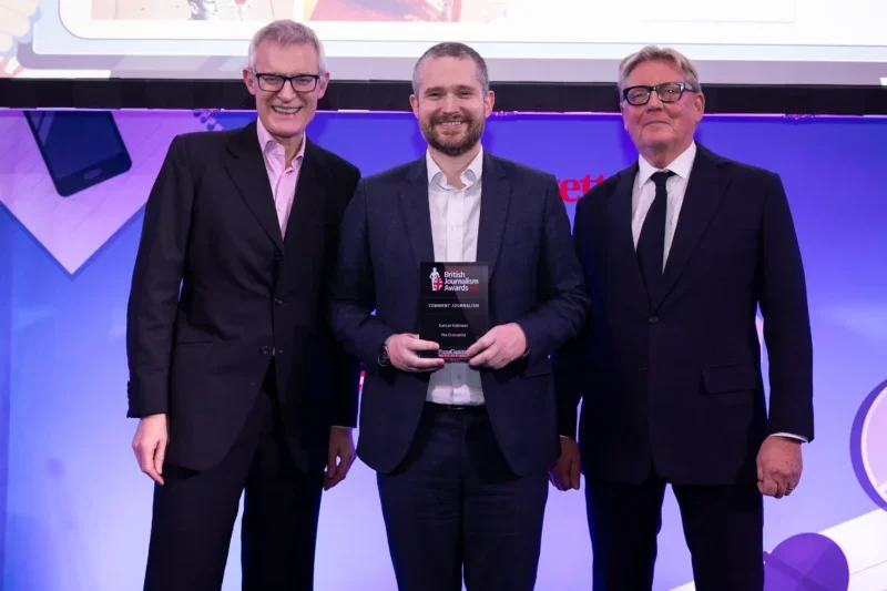 Duncan Robinson of The Economist picks up the Comment Journalism prize from Jeremy Vine and judge Richard Caseby at the British Journalism Awards 2024. Picture: ASV Photography/Press Gazette