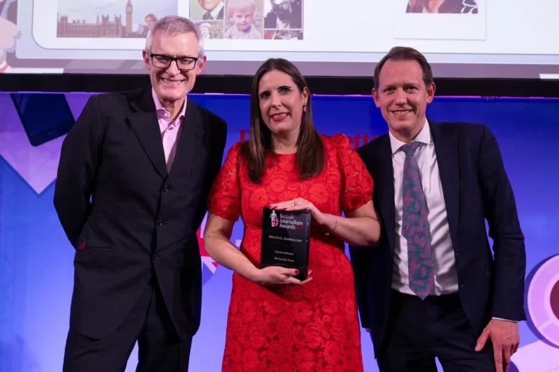 Caroline Wheeler picks up the Politics Journalism prize from Jeremy Vine and judge Neil Craven at the British Journalism Awards 2024. Picture: ASV Photography/Press Gazette