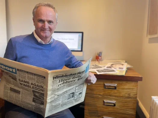 Chelsea Citizen founder Rob McGibbon pictured with a copy of the Wimbledon News, where he began his journalism career nearly 40 years ago.