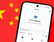 DeepSeek AI app chat seen on a smartphone and blurred Chinese flag on the background. Picture: Shutterstock/mundissima