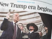 The front page of USA Today in January 2025 depicts Trump taking the vow of office, under the headline "New Trump era begins".