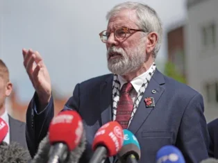Gerry Adams awarded £84,000 in damages after suing BBC for libel
