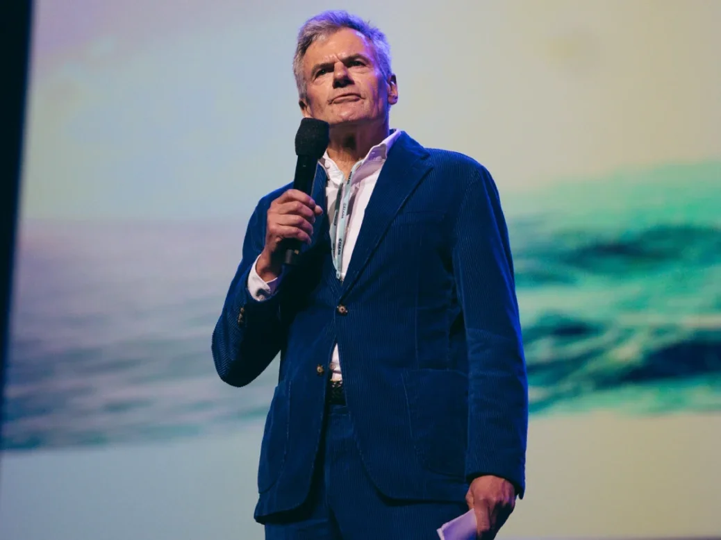 Die Zeit CEO Dr Rainer Esser speaking at the WAN-IFRA World News Media Congress in Krakow on 5 May 2025. Standing on stage holding a microphone dressed in a suit