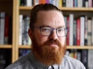 Met Police raid on journalist over Palestine tweets was illegal, judge rules