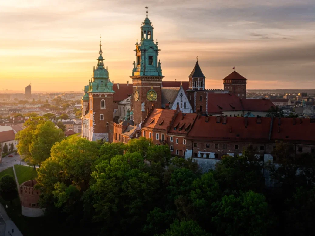 Wawel Castle in Krakow, Poland. Castle in middle of city. Sky is soft summer sunrise lighting.