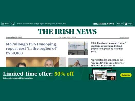 A screenshot of The Irish News homepage against a green background.