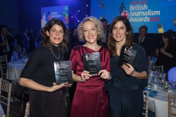Channel 4 News producer Claire Sinka, presenter Cathy Newman and editor Esme Wren after the British Journalism Awards 2025 holding three trophies