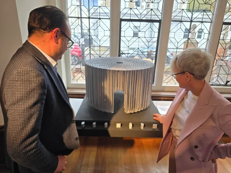 James Irving, head of fundraising at St Bride's Church, and Maria Balshaw, outgoing Tate director, with the maquette of End of Copy - winning On the Record memorial design