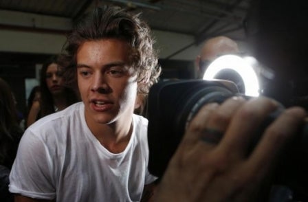 One Direction's Harry Styles wins court orders against four paparazzi photographers